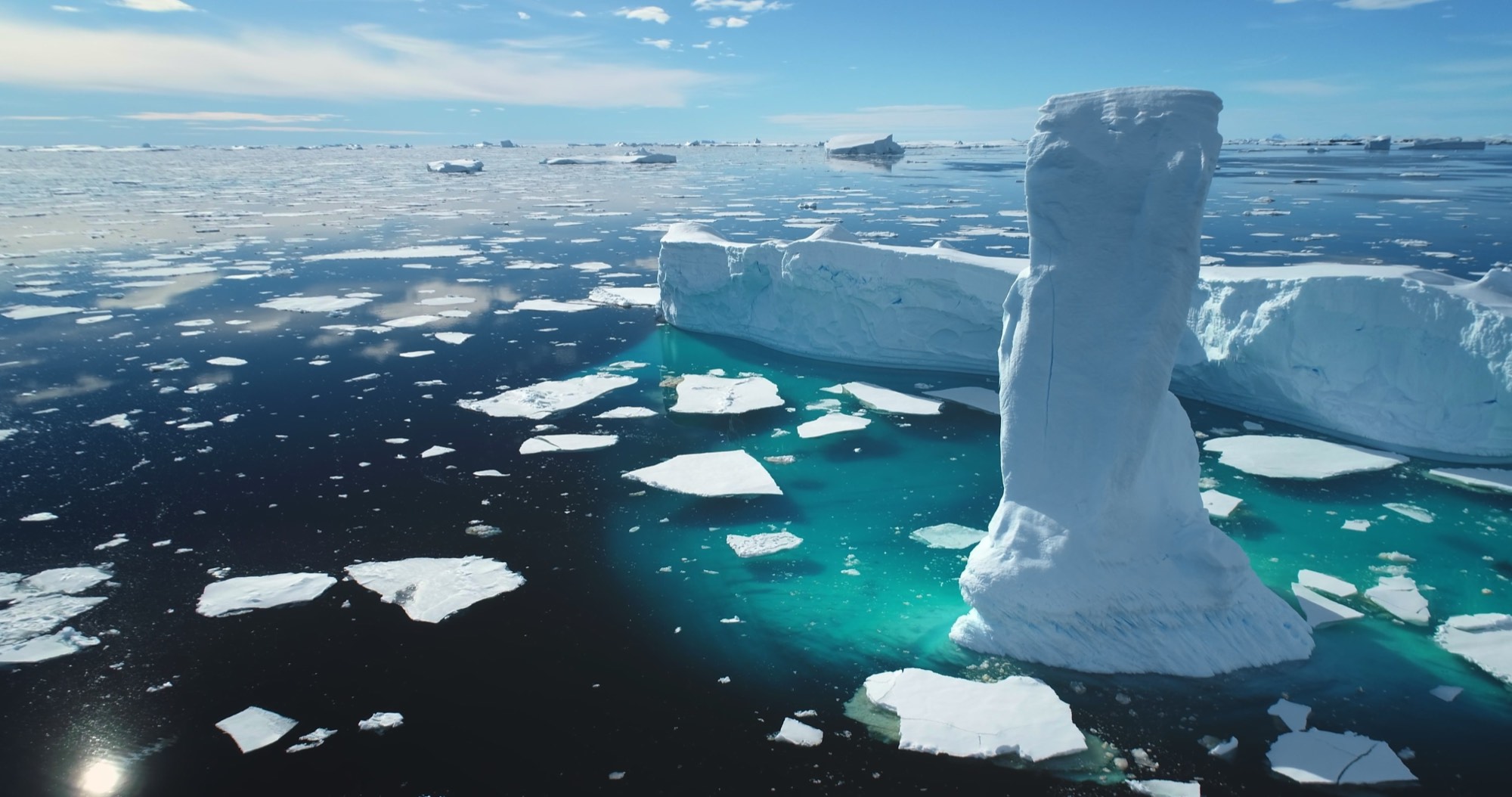 Icebergs and broken sea ice in polar water